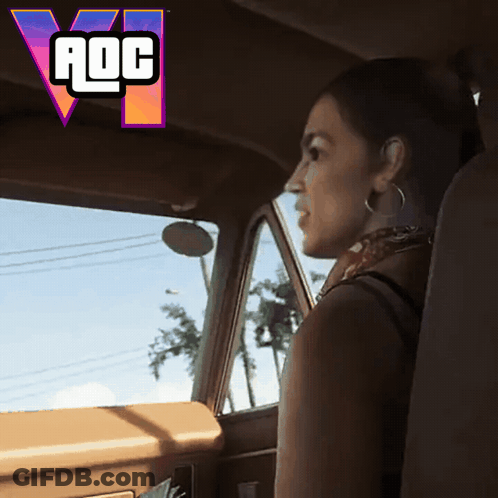 Woman In Driver Seat With AOC Logo GIF