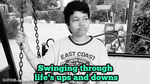 Woman In East Coast Shirt Swinging Through Life's Ups And Downs GIF