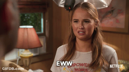 Woman In Empower Women Shirt Saying Eww GIF