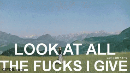 Woman In Field With Look At All The Fucks I Give GIF