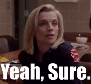 Woman In Firefighter Uniform Saying Yeah Sure GIF