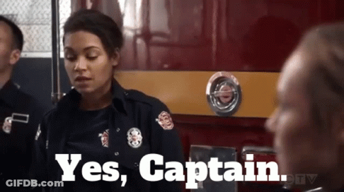 Woman In Firefighter Uniform Says Yes Captain GIF