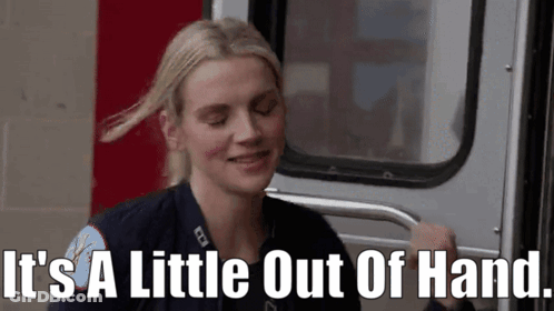 Woman In Firefighter Uniform Smiling Next To Fire Truck GIF