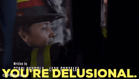 Woman In Fireman Helmet Says You're Delusional GIF