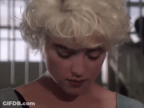 Woman In Flamingo Shirt Making Funny Face Saying Crazy GIF