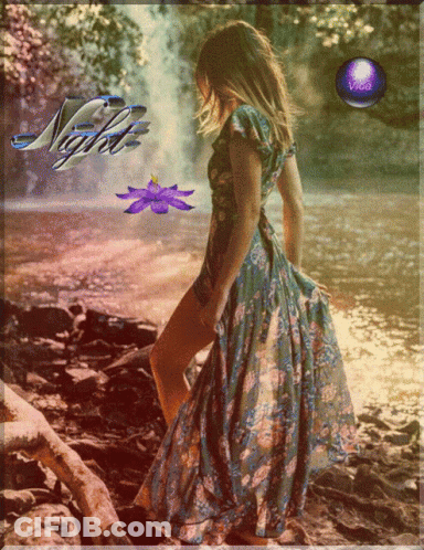 Woman In Floral Dress At Waterfall Night GIF