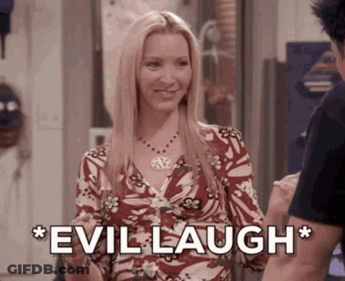 Woman In Floral Dress Laughing GIF