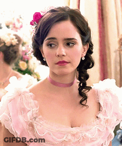 Woman In Floral Dress Making Funny Face GIF