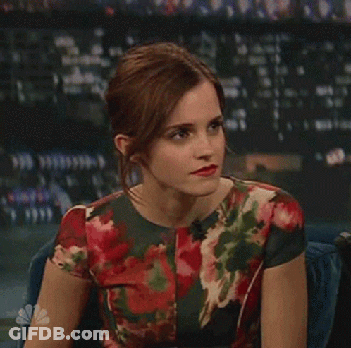 Woman In Floral Dress Making Funny Face GIF