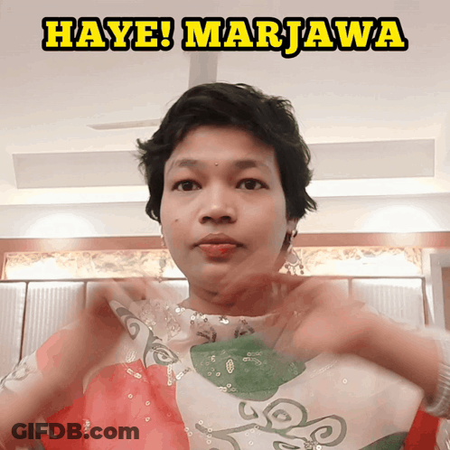 Woman In Floral Dress Saying Haye Marjava GIF