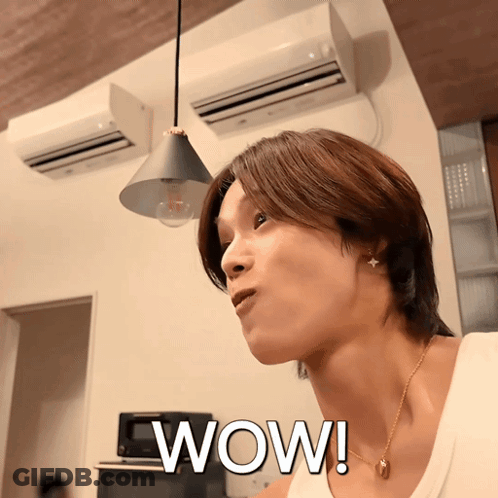 Woman In Floral Dress Says Shook GIF