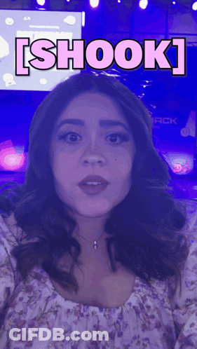 Woman In Floral Dress Says Shook GIF