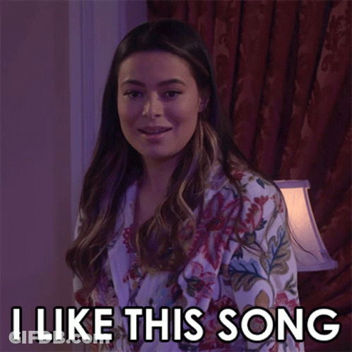 Woman In Floral Robe Saying I Like This Song GIF