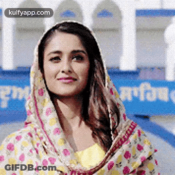 Woman In Floral Scarf Smiling GIF