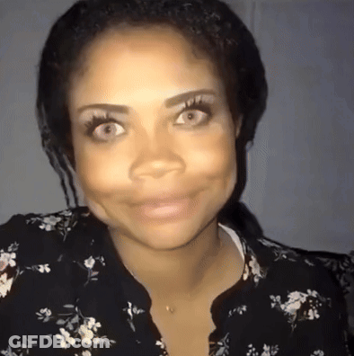 Woman In Floral Shirt Close Up GIF