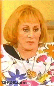 Woman In Floral Shirt GIF