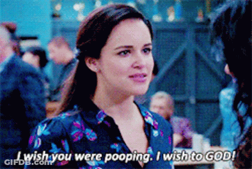 Woman In Floral Shirt Says I Wish You Were Pooping GIF