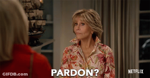 Woman In Floral Shirt Says Pardon GIF