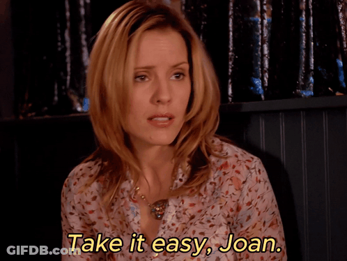 Woman In Floral Shirt Says Take It Easy Joan GIF