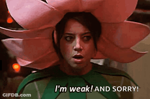 Woman In Flower Costume Says I'm Weak And Sorry GIF