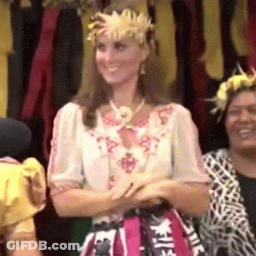 Woman In Flower Crown Smiling Next To Women GIF