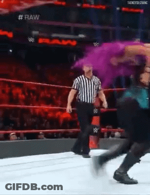 Woman In Front Of All Elite AEW Sign GIF