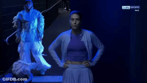 Woman In Front Of Bein Sports Sign GIF