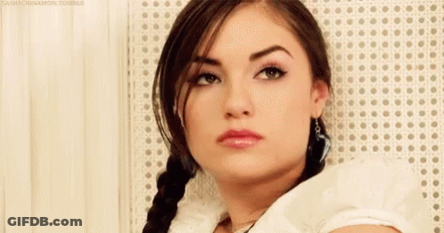 Woman In Front Of BET Logo GIF