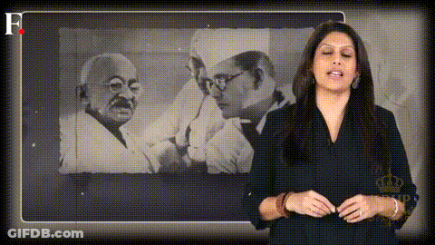 Woman In Front Of Black And White Gandhi Photo GIF
