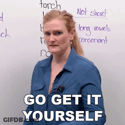 Woman In Front Of Board Saying Go Get It Yourself GIF