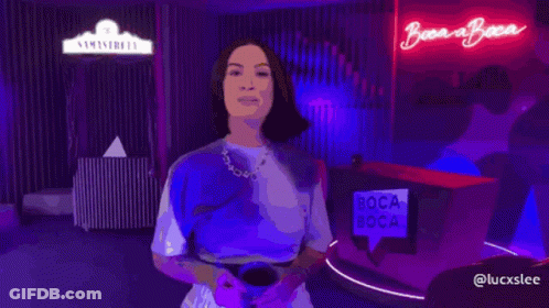 Woman In Front Of Boca Boca Sign GIF