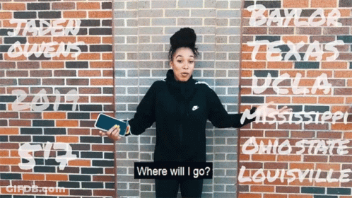 Woman In Front Of Brick Wall Saying Where Will I Go GIF
