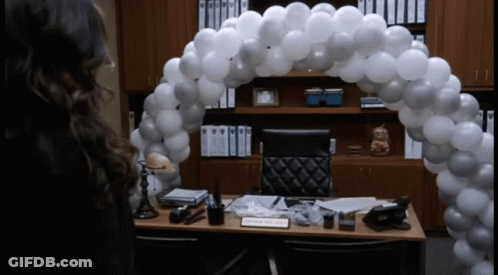 Woman In Front Of Captain Smith Name Tag GIF