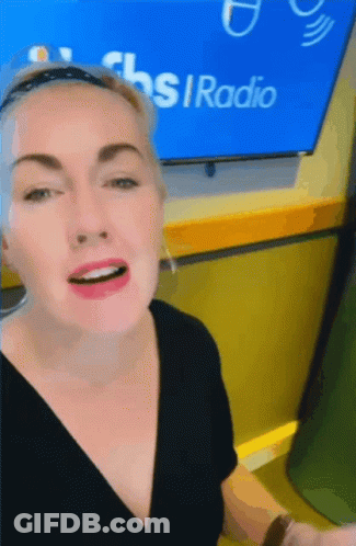 Woman In Front Of CBS Radio Screen GIF