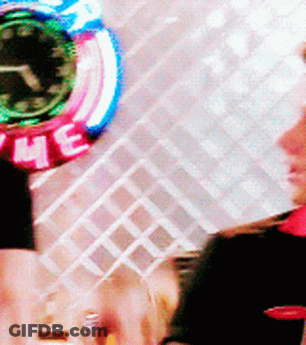 Woman In Front Of Clock Saying Where GIF