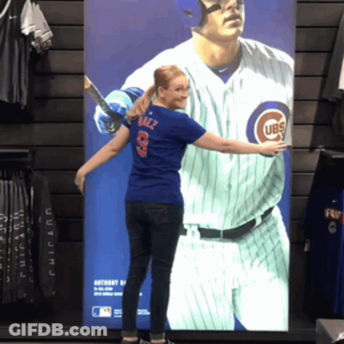 Woman In Front Of Cubs Baseball Poster GIF