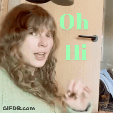 Woman In Front Of Door Saying Oh Hi GIF