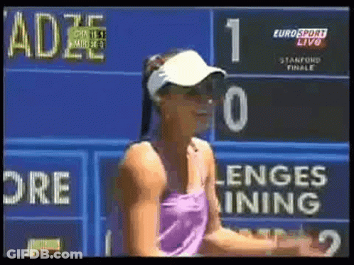 Woman In Front Of Eurosport Live Scoreboard GIF