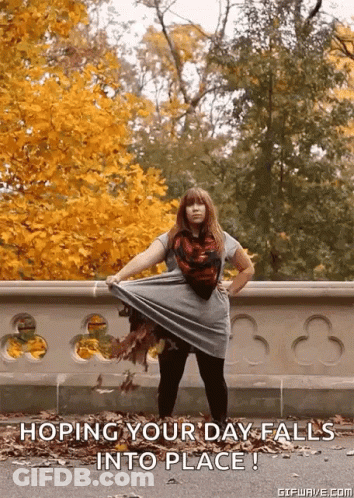 Woman In Front Of Fence Hoping Your Day Falls Into Place GIF