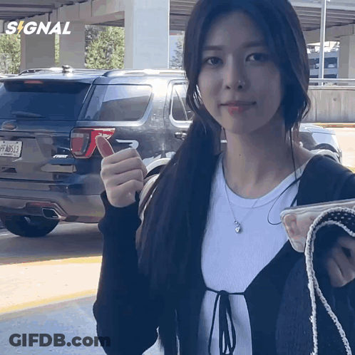 Woman In Front Of Ford Explorer GIF