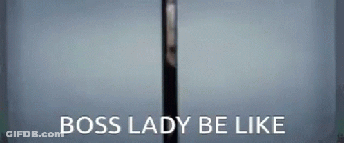 Woman In Front Of Glass Door Saying Boss Lady Be Like GIF