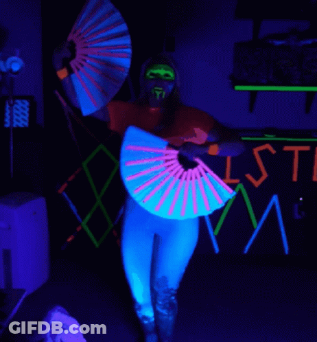 Woman In Front Of Glow In The Dark Sign Saying Isti GIF