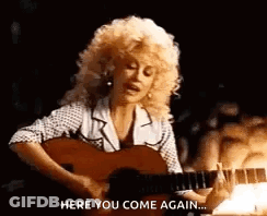 Woman In Front Of Gold Sequined Wall Says You Are Enough GIF