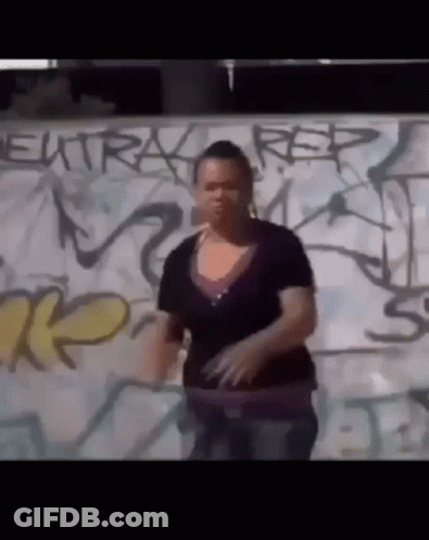 Woman In Front Of Graffiti Wall Saying Rep GIF