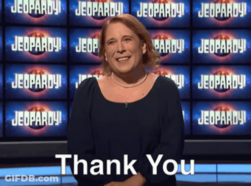 Woman In Front Of Jeopardy Screen GIF