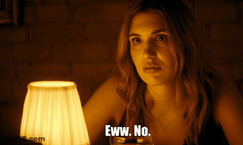 Woman In Front Of Lamp Saying Eww No GIF