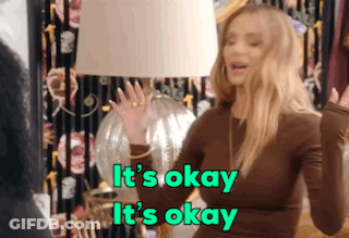 Woman In Front Of Lamp Saying It's Okay GIF