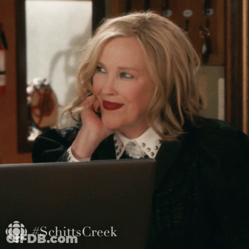 Woman In Front Of Laptop With #Schitts Creek GIF