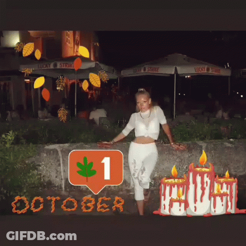 Woman In Front Of Lucky Strike Umbrella And Candles GIF