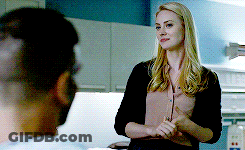Woman In Front Of Man In Kitchen GIF